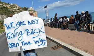 Migrants make their message clear in the Italian town of Ventimiglia on the border with France