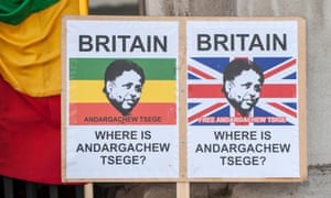 Placards demand the immediate release of UK citizen Andargachew Tsige, also sometimes spelled Tsege, who was given a death sentence in his absence.