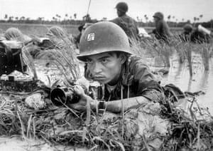 Huynh Thanh My, pinned down with a Vietnamese battalion in a Mekong Delta rice paddy, about a month before he was killed while covering combat on October 13, 1965. His younger brother, Nick Ut, later came to work for the AP