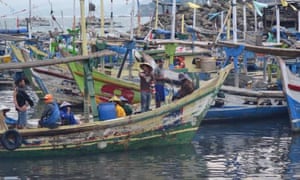 Fishermen return to Pelabuhan Ratu. A smuggler boat carrying 65 asylum seekers is believed to have set off from the fishing port before being turned around, allegedly with payments from Australian officials.