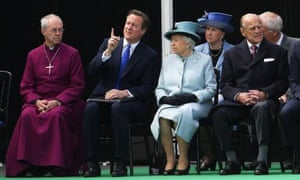 The Archbishop of Canterbury Justin Welby, Prime Minister David Cameron, Queen Elizabeth II and the Duke of Edinburgh are seated by the Magna Carta memorial at Runnymede