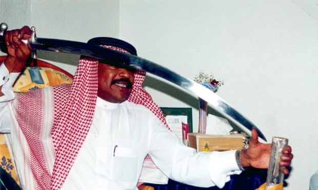 A Saudi Arabian executioner shows off his sword.