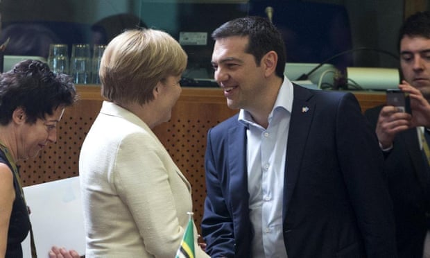 German Chancellor Angela Merkel (left) shakes hands with Greek Prime Minister Alexis Tsipras in Brussels.