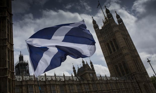 The flag of St Andrew flies outside the Houses of Parliament.