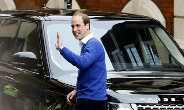 Prince William waves as he leaves the hospital where his wife gave birth.