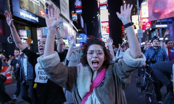 Demonstrators protest on Times Square in New York after the announcement of the grand jury decision 