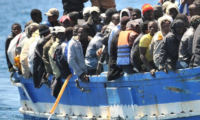 Immigrants arrive on the island of Lampedusa, southern Italy, on 9 April 2011.