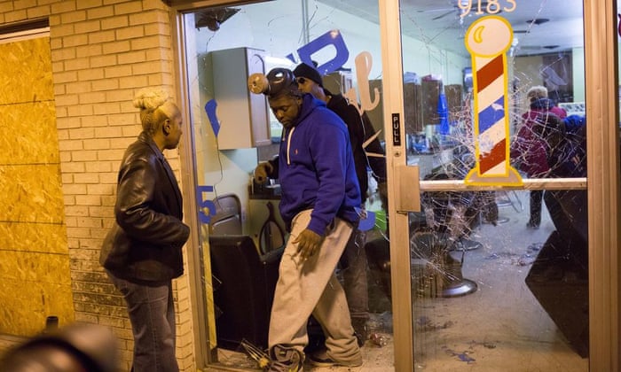 Business owners survey damage during rioting in Ferguson
