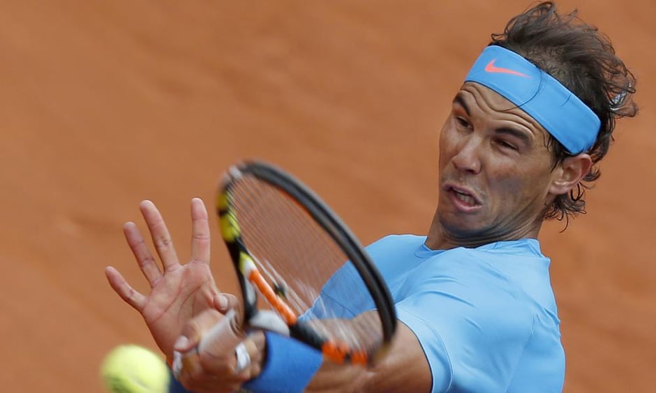 Rafael Nadal returns in the first round match of the French Open tennis tournament against Quentin Halys of France at Roland Garros in Paris, France. Nadal won in three sets 6-3, 6-3, 6-4.