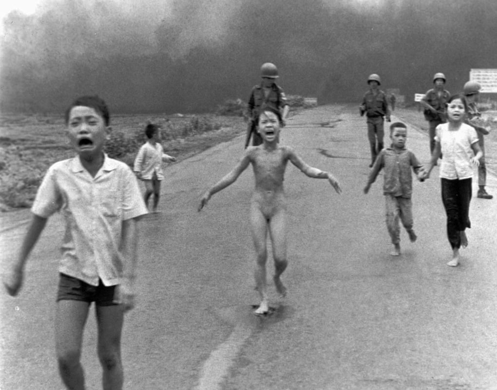 South Vietnamese soldiers escort terrified children after a napalm attack in June 1972. Photograph: Nick Ut/AP 