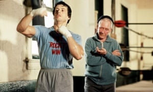 Rocky (Sylvester Stallone) is put through his paces by Mickey (Burgess Meredit   h).