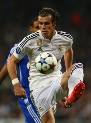 Gareth Bale controls the ball.