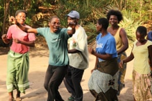 African Moringa and Permaculture Project manager Samuel Baluti (left of centre) leading Malawi-style motivational singing