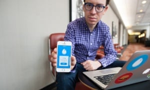 Luis von Ahn shows off Duolingo on his iPhone.