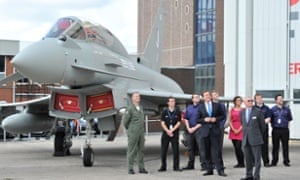 David Cameron watches a Eurofighter Typhoon during a visit to BAE Systems in Warton, Lancashire.