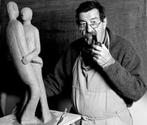 Günter Grass, with one of his sculptures – and his pipe.