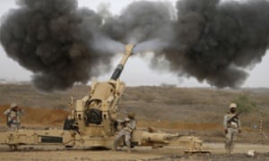Saudi army artillery fires shells towards Houthi positions from the Saudi border with Yemen.
