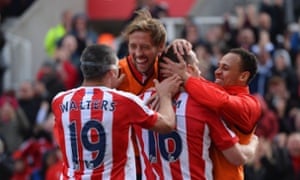 Smiles all round as Adam celebrates with team-mates.