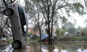Cars are left stranded among trees following the overnight flash floods in Grabels near Montpellier, France in 2014.
