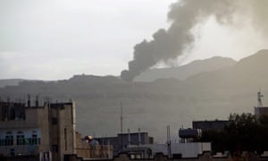 Smoke rises over Sana'a after airstrike by Saudi-led coalition against Houthi rebels in Yemen.