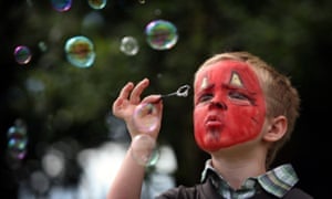 Child blowing bubbles