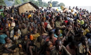 Burundian refugees gather on the shores of Lake Tanganyika in Kagunga village in Kigoma region in western Tanzania, as they wait for MV Liemba to transport them to Kigoma township, May 17, 2015. Burundi President Pierre Nkurunziza on Sunday made his first public appearance in the capital Bujumbura since an attempted coup last week failed to oust him from power, saying he was monitoring a threat posed by Islamist militants from Somalia.