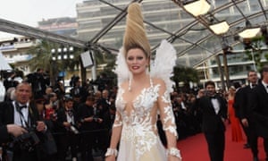 Russian TV presenter Elena Lenina risked the embarrassment of low ceilings at this year’s festival after losing a kitchen roll holder in her hair.
