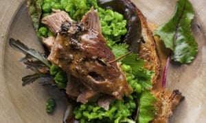 Nigel Slater's leftover lamb sandwiches with crushed peas and wasabi on a wooden plate