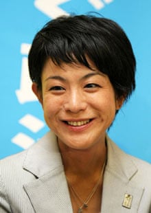 <b>Eriko Fukuda</b> smiles after winning her seat in parliament, in August. - Eriko-Fukuda-smiles-after-001