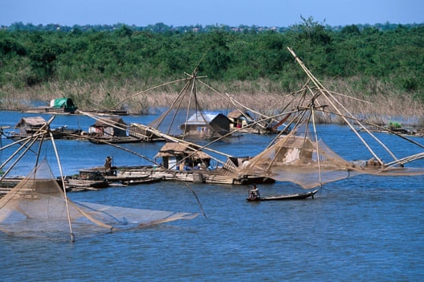Traditional fishing methods at Kompong Cham on the Mekong river.
