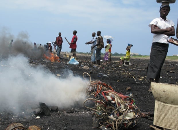 At the Agbogbloshie site in Accra, Ghana wire is being burned to free the copper from its plastic casing