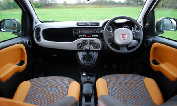 The Fiat's funky and fun but comfortable orange and grey interior