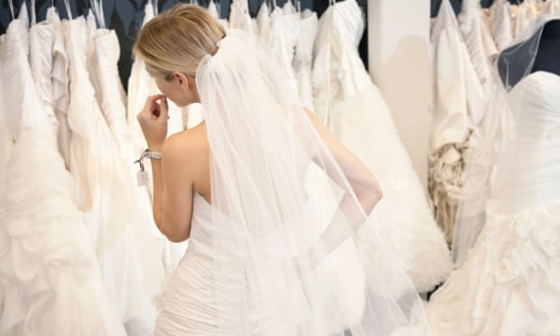 A bride choosing dresses