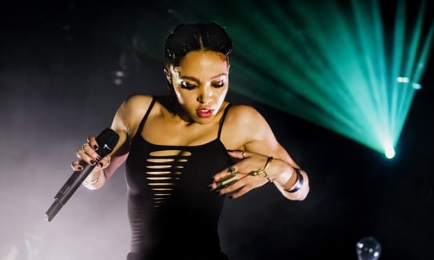 FKA Twigs (Tahliah Debrett Barnett) performs on stage at Tolhuistuin on October 15, 2014 in Amsterdam, Netherlands