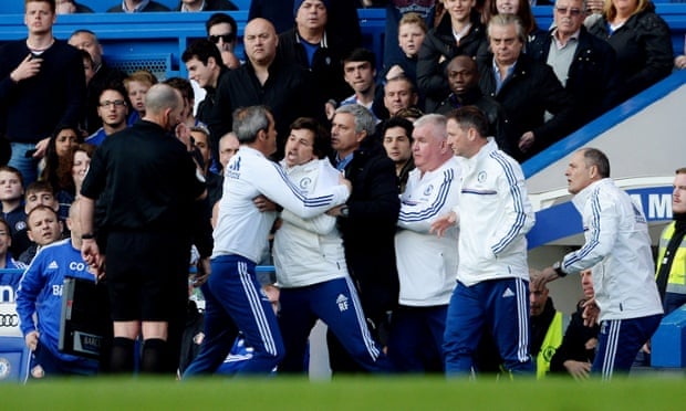 Football - Chelsea v Sunderland - Barclays Premier League - Stamford Bridge - 19/4/14 Chelsea assistant first team coach Rui Faria (C) clashes with referee Mike Dean after Sunderland score their second goal from a penalty as manager Jose Mourinho looks on Mandatory Credit: Action Images / Tony O'Brien Livepic EDITORIAL USE ONLY. No use with unauthorized audio, video, data, fixture lists, club/league logos or 