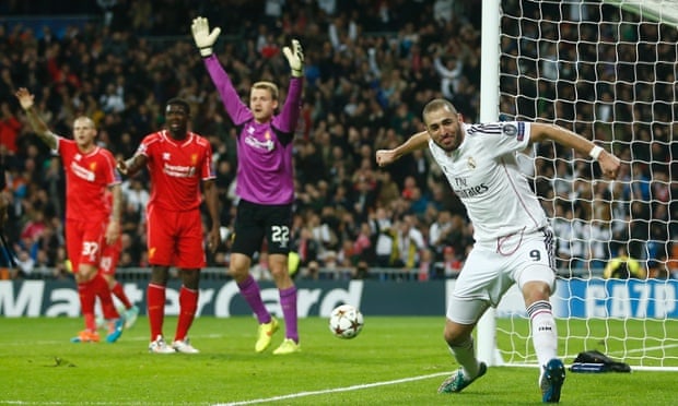 Real Madrid's Karim Benzema celebrates after scoring the opening goal.