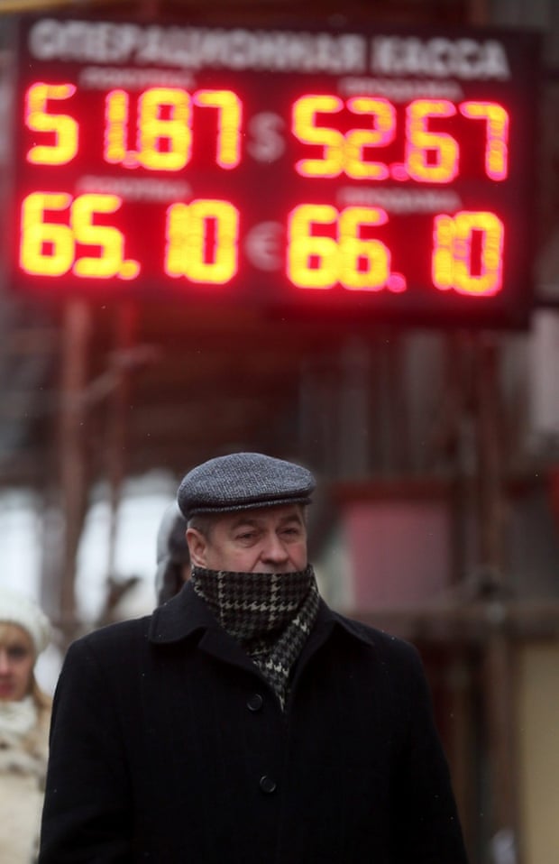 Ruble tumbles after oil hits five-year low, before recovering.