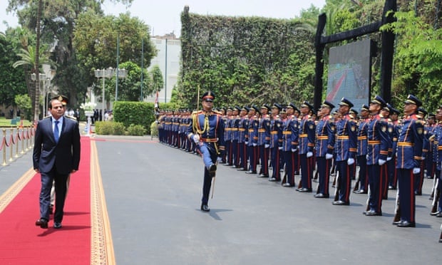 President Abdel Fatah al-Sisi reviews a guard of honour after being sworn in as president of Egypt in June.