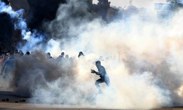 Supporters of the ousted president Mohamed Morsi clash with security forces near Cairo University earlier this year.