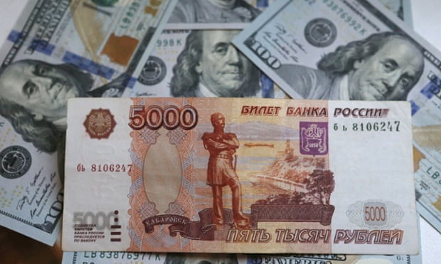 Rouble surges as Moscow fights back against financial crisis.