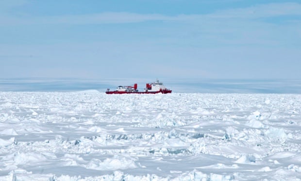The Chinese Antarctic vessel Xue Long seen from the bridge of the Aurora Australis ship off Antarctica, both in the frozen waters to help rescue the nearby Russian research ship.