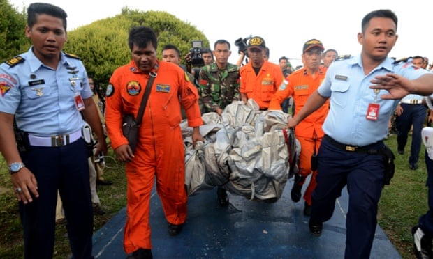 AirAsia flight QZ8501: crews continue grim task of retrieving.