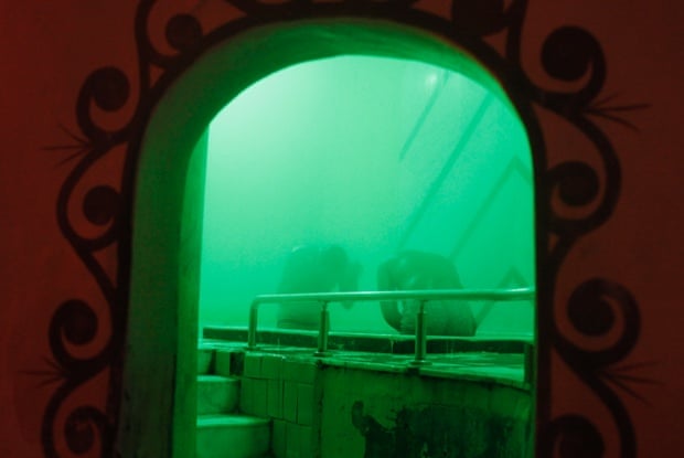 Men relaxing at a steam room or hammam in Cairo