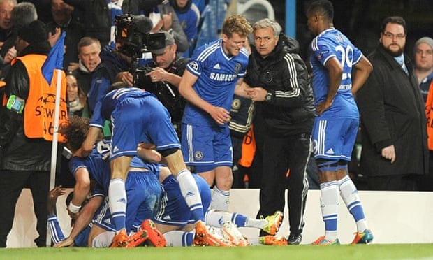 Chelsea's manager Jose Mourinho joins in the celebrations after Demba Ba scores his side's second goal during the Champions League Quarter Final against Paris St-Germain.