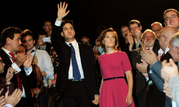 Ed Miliband and his wife Justine Thornton walk past delegates following his speech at Manchester Central.