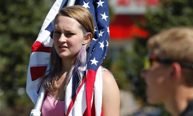 Jordan Gleason, of Columbine High school, participates in a protest. school board ap history colorado