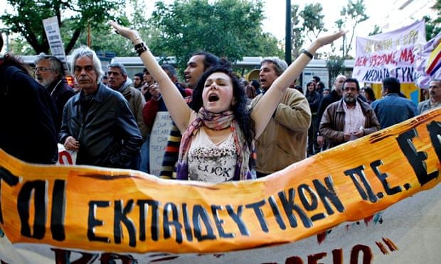 Protesters outside the Greek parliament in Athens during a demonstration against the Government's fi