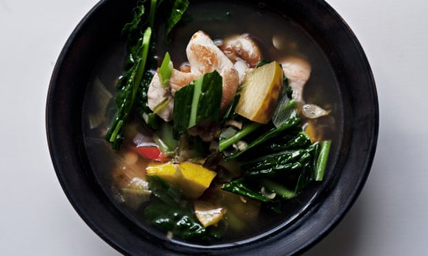 Nigel Slater's chicken, cavolo nero and squash soup in a deep bowl