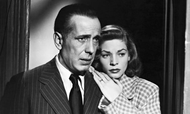 Humphrey Bogart as Philip Marlowe with Lauren Bacall in The Big Sleep.