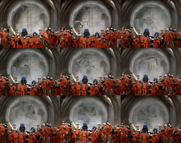 Composite image of workmen looking on as tunnel machine, named Elizabeth after the Queen, breaks through into the east-end of Crossrail's Liverpool Street station in London.